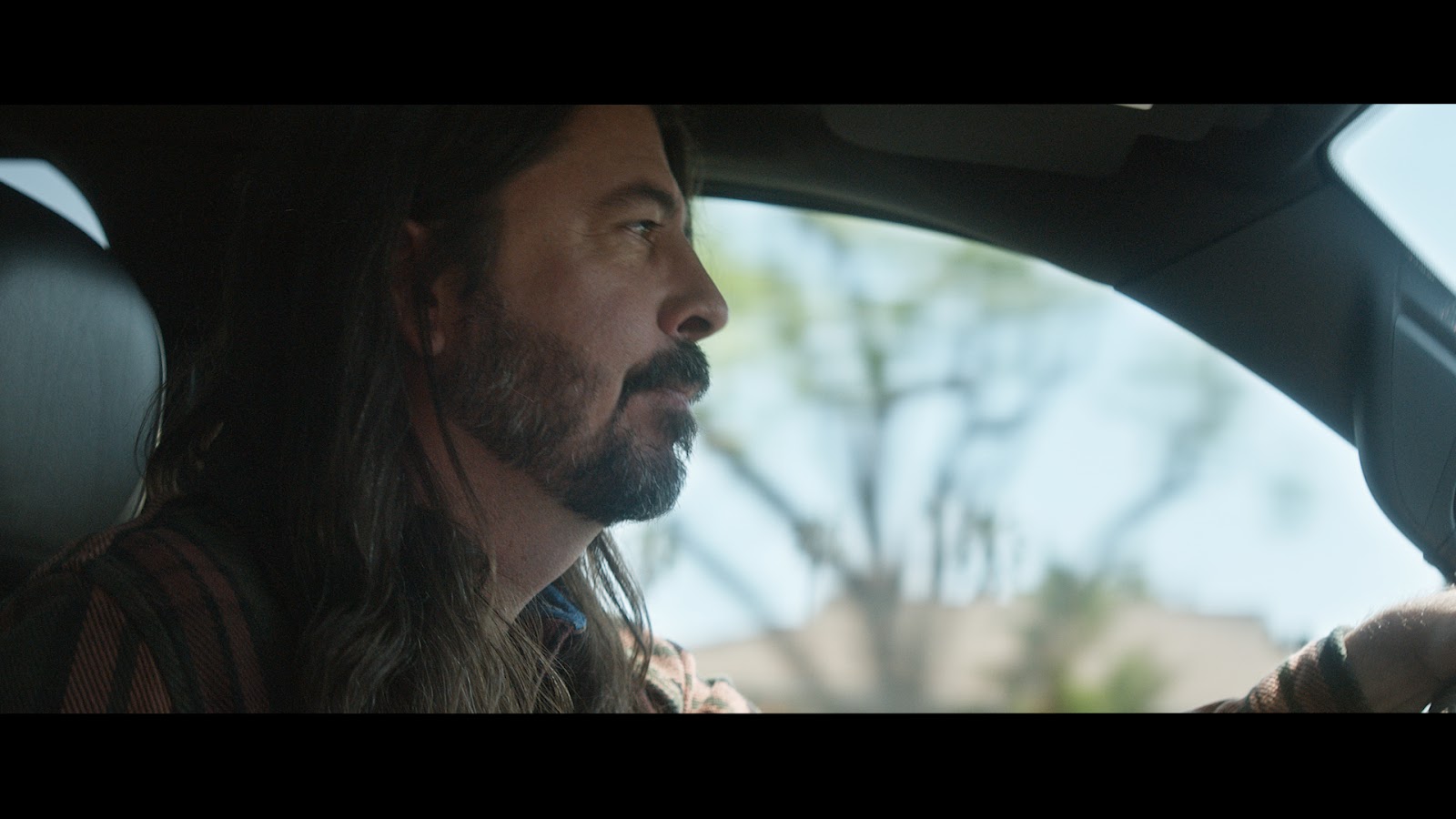 David Grohl of the Foo Fighters sits in a Ram Truck.