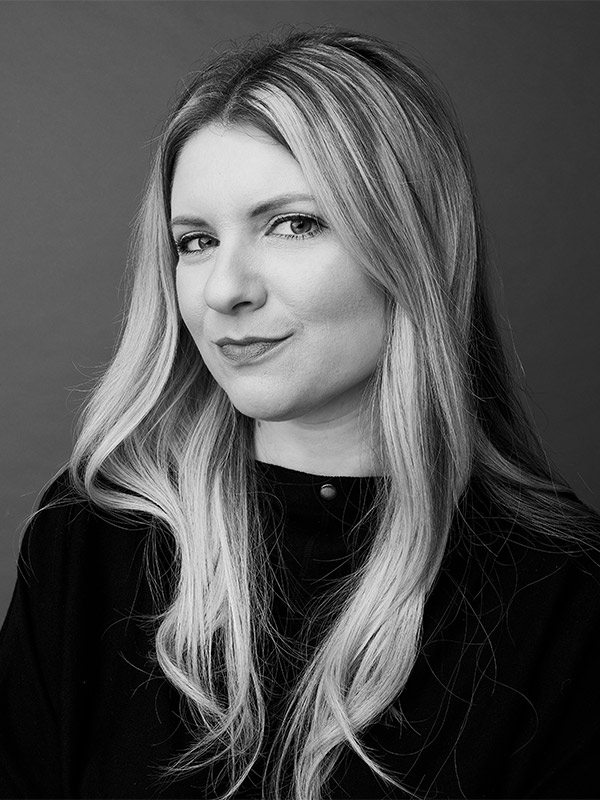 A black and white headshot of Becky Foster.