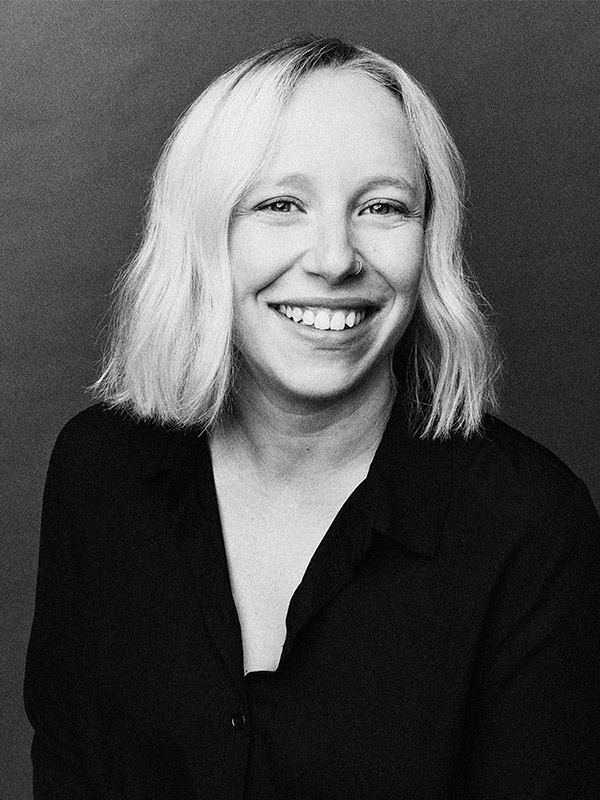 A black and white headshot of Christina Persico.