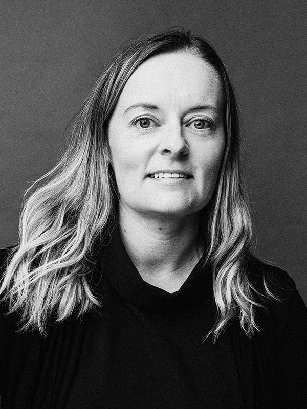 A black and white headshot of Helen Timberlake.