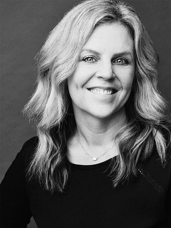 A black and white headshot of Joni Miller.