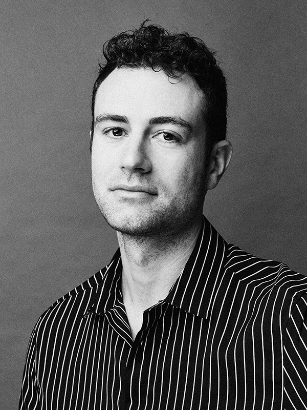 A black and white headshot of Matt Weiner.