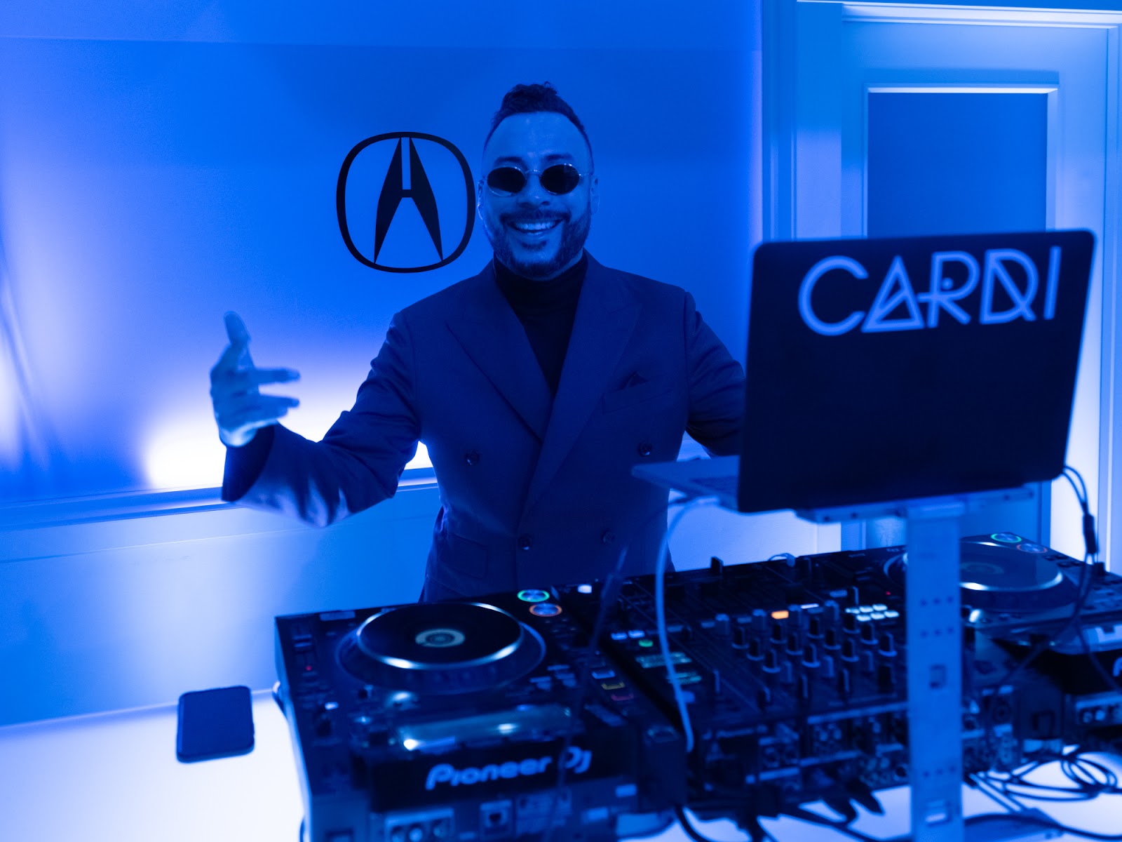 A DJ performs at the Acura Sundance Film Festival.