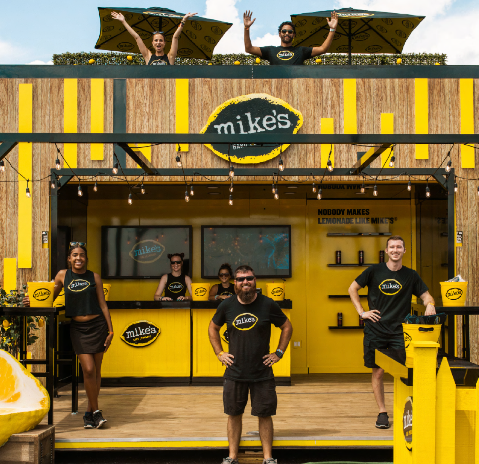 Coordinators pose at the Mike's Hard Lemonade pop-up.