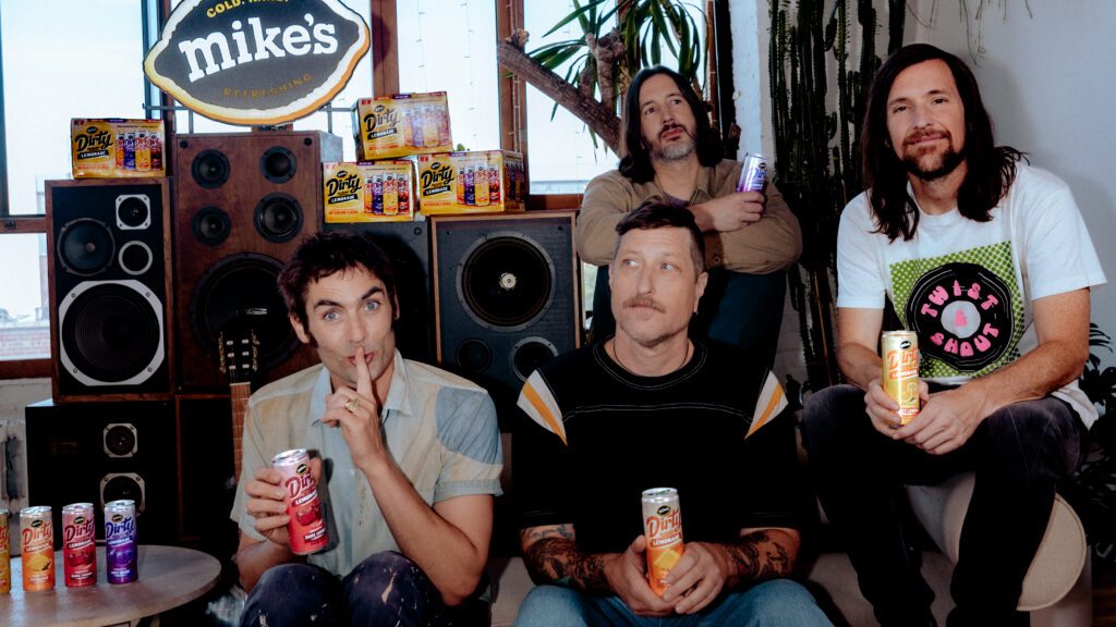 Group shot of All-American Rejects posing with Mike’s Dirty Lemonade